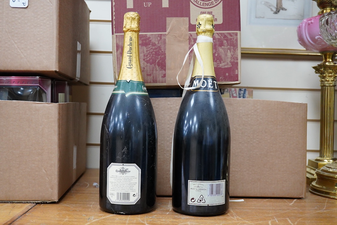 A Magnum bottle of Moet & Chandon champagne and a Magnum Canard-Duchene